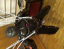 Suspended Rubberslave Gets A Cbt By Estim