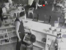 Security Cam Footage Of A Sexy Brunnette Giving Head In A Store