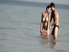 Dude Playing Around With A Topless Girl