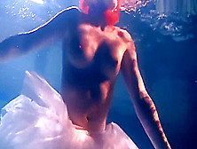 Bulava Lozhkova With A Red Tie And Skirt Underwater