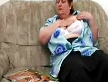 Chunky Older Woman Masturbating On The Couch