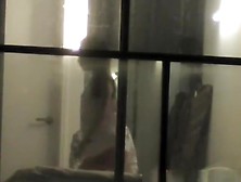 Voyeur Neighbor Films Couple Through Window