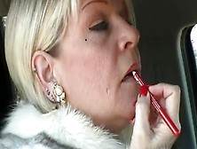 Milf Angelique In Fur Coat Applies Lip Stick In Her Car