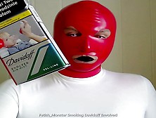 Smoking Davidoff Envolved 100S In Red Latex Mask And Gloves