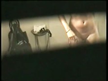 Busty Brunette Filmed Naked By A Window Voyeur