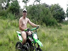 Sporty Aussie Hunk Riding A Dirt Bike With His Bare Booty Exposed