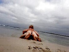 Showing Off Booty Plug At Nudist Beach.