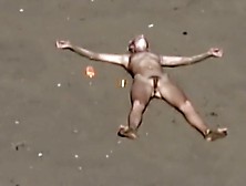 Dirty Nudist Girl On The Beach