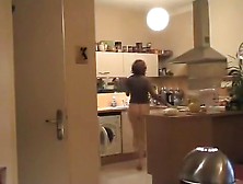 Happy Bottomless Amateur Filmed In The Kitchen