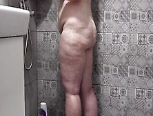 A Concealed Camera Inside The Shower Room Spies On A Older Ex-Wife With A Plump Figure And Gigantic Jugs And