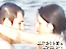 Sassy Couple Voyeured In The Water Seems To Be Fucking