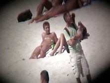 Hot Naked Babes Exposing Their Pussy At The Beach