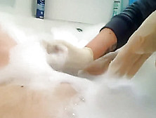 Bathtub Latex Glove Handjob
