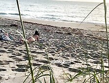 Spying Goddess Milf Touching At The Beach