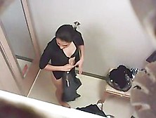 Naughty Voyeur Video Of A Black Haired Beauty In The Changing Room