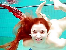 Divine Polish Redhead Swims In The Pool And Shows Off