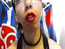 Bright Red Lipstick Drooling A Pile Of Saliva And Drool