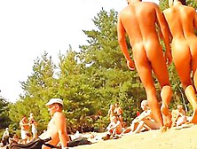 Naked Couples Have Fun Playing With Ball On The Beach
