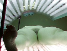 Milf Tanning Her Shaved Tight Pussy