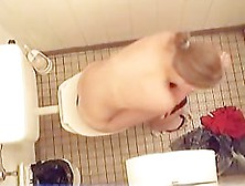 Naked Girl Is Pissing On The Hidden Cam In The Toilet