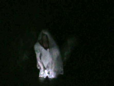 Big Wedding Gown In A Ditch At Night
