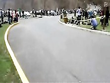 Longboarder Takes Out Spectator In Style