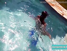 Cutie Dark Hair Bimbo Candy Swims Underwater