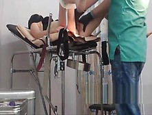 Girl In A Black Mask.  Exam In Gyno Chair