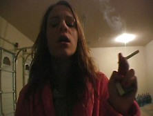 Teenager In Bathrobe Smokes Sensually