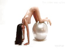 Naked Babe Playing With A Big Ball