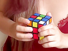 Busty Asian Teen Gives Up On Solving Rubik's Cube And Plays