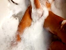 Big Boobed Blonde Eighteen Masturbates Into The Hot Tub