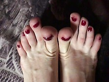 Red Painted Toenails Close Up