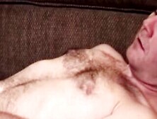 Hairy Dude Strips Down And Jerks Off His Dick Until He Cums