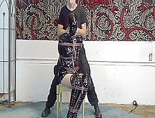 Pvc Raincoat Bound Gagged And Tormented