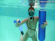 Scuba Diving Girl In A Pool Sucks On A Dildo