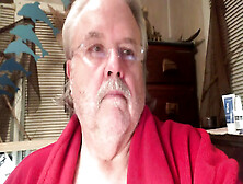 Charles Johnson Sitting In Red Fleece Robe