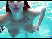 Bikini Girl Strips In The Pool For Skinny Dipping Fun