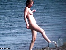 Nudist On Her Knees