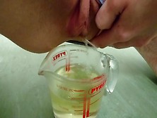 Pee In Measuring Cup | Close Up
