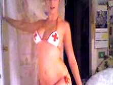 Busty Hottie Strips With Her Bikini