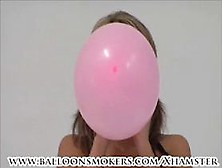 Teen Blows To Pop Pink Balloons