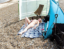 A Young Blonde Wife Is Nude And Masturbating On A British Public Beach