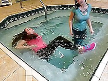 Clothed Lesbians In Indoor Pool