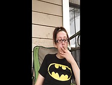 Nerdy Goddess D Smoking Cork Tip 100 Cigarette In Batman Shirt And Glasses
