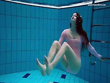 Redhead Teen Hottie Liza Undresses Her Swimsuit Underwater