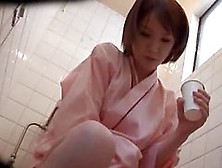Asian Babe Takes A Piss Sample For Her Doctor To Check