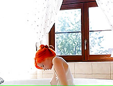 Sexy Redhead In The Bath