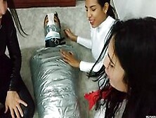 Latino Hunk Heavily Mummified By Cooperative Femdom Women (High Res Mp4)