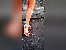 Red High Heels Wedge Walking In Street